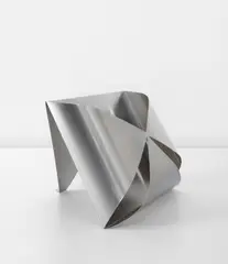 "Enveloppe" magazine holder by Maria Pergay, circa 1968, Stainless steel, sold Jun 2013