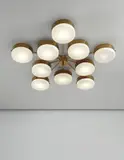 Ceiling light by Gio Ponti, circa 1955, Polished brass, painted brass, opaque glass, sold Jun 2013