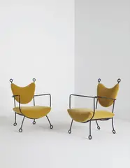 Jean Royere, Pair of “Yo-Yo” armchairs, circa 1957, Painted wrought iron, mohair