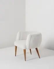 Jean Royere, "Boule" armchair, circa 1950, Sheepskin, oak