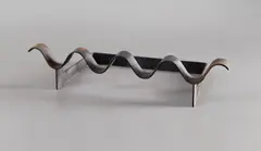 "Ondulation" andiron by Jean Royere, circa 1937, Wrought iron, offered Dec 2013