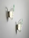 Max Ingrand, Pair of wall lights, model. no. 1552, circa 1957, Clear and opaque glass, nickel-plated brass