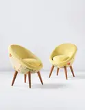 Jean Royere, Pair of high "Œuf" chairs, circa 1953, Printed fabric, fabric, teak
