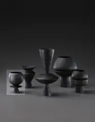 Cup on stand with central disc by Hans Coper, circa 1965, Stoneware, black glaze, sold Dec 2013