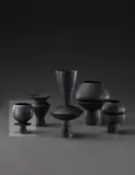Cup on stand with central disc by Hans Coper, circa 1965, Stoneware, black glaze, sold Dec 2013