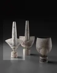 "Cycladic" arrow form by Hans Coper, circa 1972, Stoneware, layered white porcelain slips and engobes over a body with textured and incised linear designs, the interior , sold Dec 2013