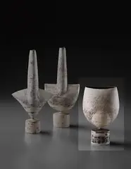 "Cycladic" pot with spherical volume and oval lip by Hans Coper, circa 1974, Stoneware, layered white porcelain slips and engobes over a body with textured and incised linear designs, the interior , sold Dec 2013