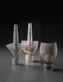 "Cycladic" pot with wide shoulder by Hans Coper, circa 1972, Stoneware, layered white porcelain slips and engobes over a body with textured and incised linear designs, the interior , sold Dec 2013