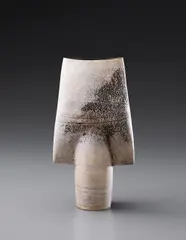 "Spade" form by Hans Coper, circa 1969, Stoneware, layered white porcelain slips and engobes over a body with textured and incised linear designs, the interior , sold Dec 2013