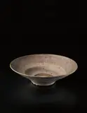 Large open form bowl by Lucie Rie, circa 1960, Stoneware, flowing "Dolomite" glaze with an unglazed ring in the well, sold Dec 2013