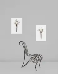Pair of "Soleil" wall appliques by André Dubreuil, circa 1987, Patinated steel, copper, magnifying glass, offered Dec 2013