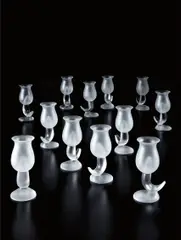Frank Gehry, Set of twelve “Fish” goblets, circa 1990, Acid-polished glass