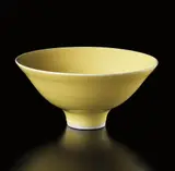 Footed bowl by Lucie Rie, circa 1974, Porcelain, "American" yellow glaze, sold Dec 2013