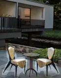 André Dubreuil, Pair of "Trévise" chairs, circa 1988, Painted cast aluminum, fabric