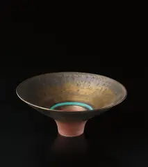 Footed bowl by Lucie Rie, circa 1980, Porcelain, golden manganese glaze, turquoise rings, terracotta foot and well, sold Dec 2013