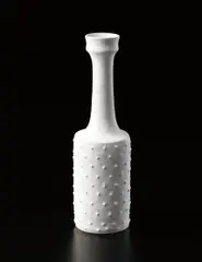 Lucie Rie, Rare bottle with raised dots, circa 1976, Porcelain, squared body, matte white glaze
