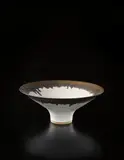 Large bowl by Lucie Rie, circa 1980, Stoneware, matte white glaze with golden lip, sold Dec 2013