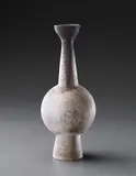 Tall bottle vase with central ovoid volume by Hans Coper, circa 1956, Stoneware, layered white porcelain slips and engobes over a body with textured and incised linear designs, the interior , sold Dec 2013