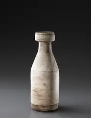Large bottle by Hans Coper, circa 1958, Stoneware, layered white porcelain slips and engobes over a body with textured and incised linear designs, the interior , offered Dec 2013