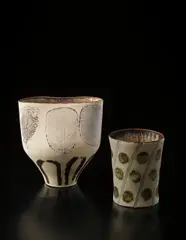 Pot with ovoid lip by Lucie Rie, circa 1974, Porcelain, inlaid "feather" designs beneath pale yellow glaze, offered Dec 2013