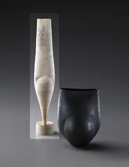 Tall "Cycladic" form by Hans Coper, 1967, Stoneware, layered white porcelain slips and engobes over a body with textured and incised linear designs, the interior , sold Dec 2013