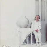 Lord Snowdon, Dame Lucie Rie Seated Beside the Korean Pot, circa 1990, Color photograph