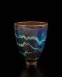 Footed vase by Gertrud Natzler and Otto Natzler, 1962, Earthenware, blue, turquoise and copper glaze with iridescence, crystal formations and flow patterns, sold Dec 2013