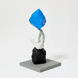 Ugo Rondinone, small black white blue mountain, 2025, painted stone and stainless steel on artist's base