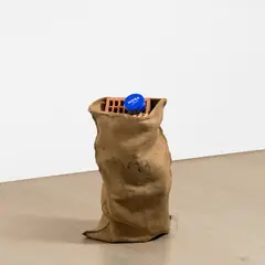 Georg Herold, Untitled, 1998, Nivea tin, bricks and sack