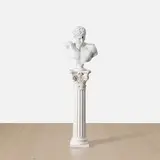 Banksy, Bullet Hole Bust, 2006, fiberglass resin and acrylic paint, on artist's plaster plinth