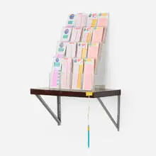 Kevin Landers, Lottery Shelf, 2005, Plexiglas, plastic, synthetic string, vinyl and ink on paper