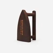 Cadeau by Man Ray, cast iron, steel tacks, sold Mar 2026