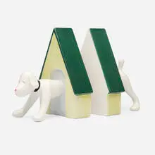 Yoshitomo Nara, Puppy bookends, 2002, glazed porcelain