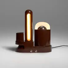 Gae Aulenti, Rimorchiatore table lamp, 1967, enameled aluminum, plastic, glazed stoneware, enameled metal