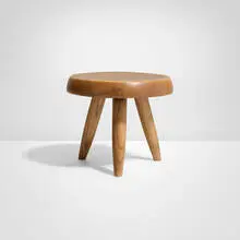 Low stool by Charlotte Perriand, 1947, ash, sold Oct 2025