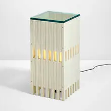 Illuminated pedestal by Ettore Sottsass, 1962, painted beech, glass, sold Oct 2025