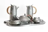 Archibald Knox, Five-piece pewter 'Tudric' tea set