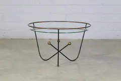 Edward Ihnatowicz, 'Atom' coffee table, 1950s, the circular glass top supported on a wrought steel base