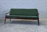 Hartmut Lohmeyer, German 'Model 400' teak and cane settee, 1962, the seat and back cushions upholstered in green velvet