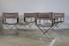 Alessandro Albrizzi, 'Set of four chrome director's chairs, c.1960, each upholstered in grey vinyl over an 'X' form frame