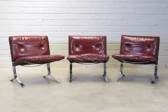 Olivier Mourgue, Set of three French 'Joker' lounge chairs, 1960s, each chromed steel frame raised from 'T' shaped supports
