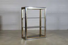 Renato Zevi, Chrome and brass bookcase, c.1970, the chrome frame with brass edging
