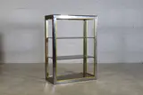Renato Zevi, Chrome and brass bookcase, c.1970, the chrome frame with brass edging