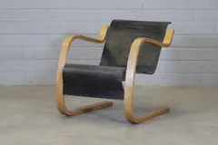 Alvar Aalto, ‘Model 31’ lounge chair, 1932, the stained birch bentwood seat and back with birch bentwood armrests