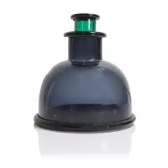 'Basilissa' by Ettore Sottsass, 1972, the blue incalmo glass body with a green neck, sold Jul 2024