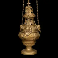 Incensario, FRANCIA, CA, 1900, Bronce laminado, repujado con relieves de figuras vegetales y serafines, remate calado