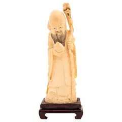 Sabio Oriental, CHINA, SIGLO XX, Talla en marfil con detalles entintados y base de madera