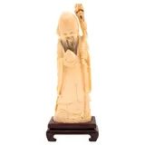 Sabio Oriental, CHINA, SIGLO XX, Talla en marfil con detalles entintados y base de madera