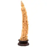 Guan Yin, CHINA, FINALES DEL SIGLO XIX, Talla en marfil con detalles entintados y base de madera ebonizada