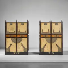 Carlo Bugatti, Pair of cabinets, circa 1900, Stained walnut, stained walnut with brass and pewter inlay, walnut, parchment, brass